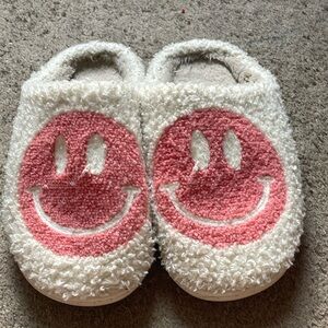 pink smiley slippers